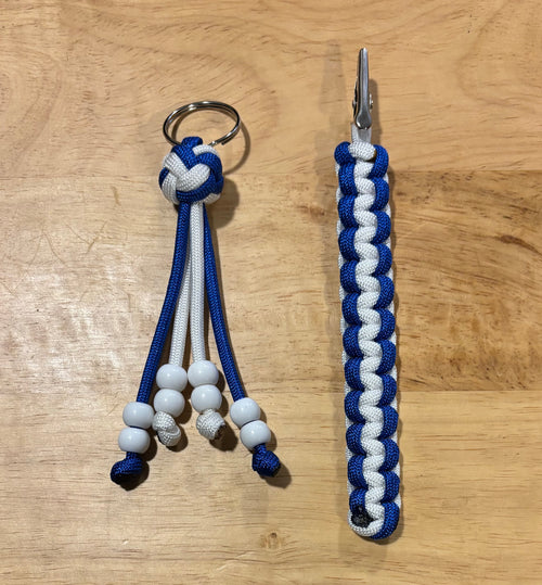Blue and white keychain with matching card grabber/roach clip.